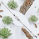 Bracelet Chaîne en Inox avec double losange croisé et pierres Hématite