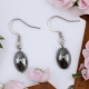 Boucles oreilles avec une pierre d'hématite en forme de goutte