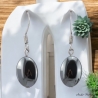 Boucles oreilles avec une pierre d'Hématite plate