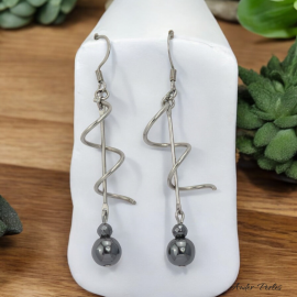 Boucles Oreilles Torsade inox ornées d'Hématite