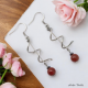 Boucles Oreilles Torsade inox ornées d'Agate Rouge