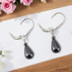 Boucles oreilles dormeuses en argent 925 ornées de pierres d'Hématite